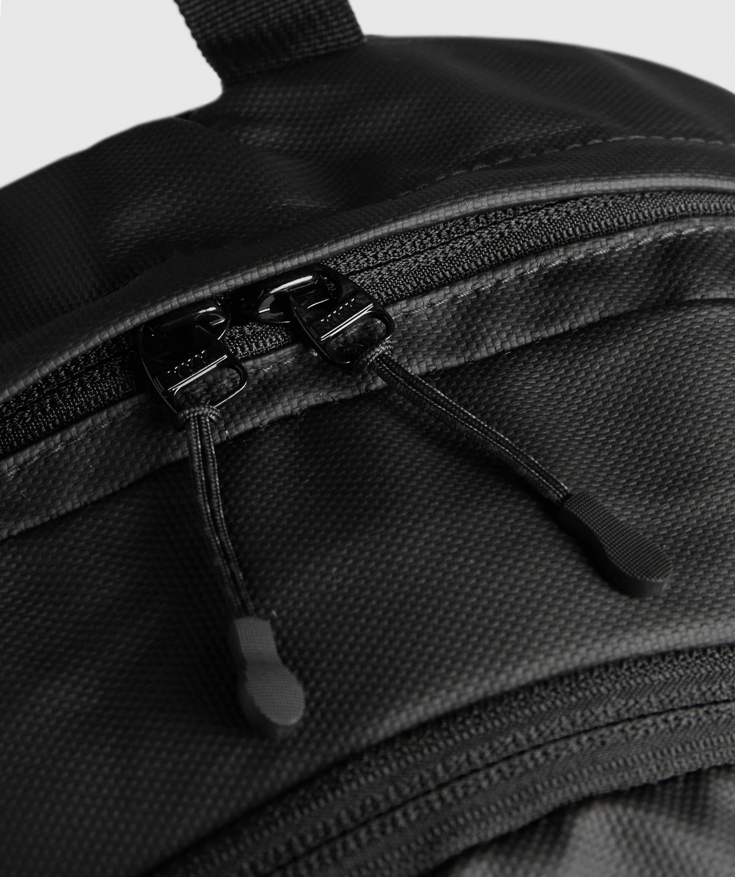 COATED PURSUIT BACKPACK