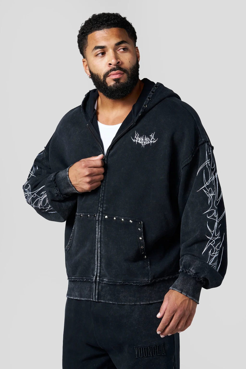 TRIBAL STUD ZIP-UPS